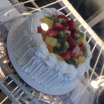 Caketory - a close up of a cake in a display case - Bakeries Near Me - Lauderhill, Florida