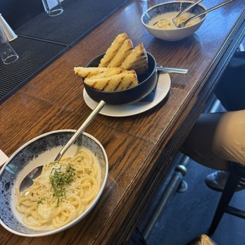 Feller - Cacio e pepe (we asked to split one order of this pasta) fresh bread so good - New American Near Me - Stillwater, Minnesota