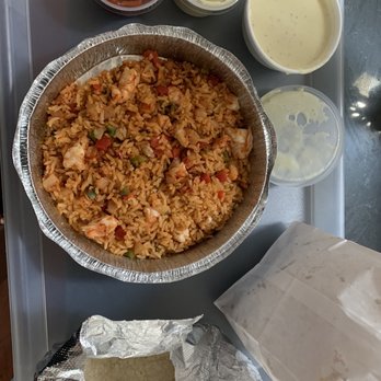 Fiesta Maya - To go portion of arroz con camarones (shrimp and rice) along with queso dip. - Mexican Near Me - Charlotte, North Carolina