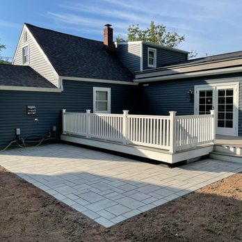 Timeless Remodeling - Family room addition, composite wood deck, and stone paver patio remodel by Timeless Remodeling of South Plainfield, NJ. - General Contractors Near Me