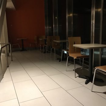Dunkin' -  empty tables and chairs in a restaurant - Coffee & Tea Near Me - Arlington, Virginia