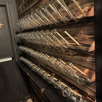 Just The Tap - a rack of baseball bats - Beer Bar Near Me - Seattle, Washington Just The Tap - a rack of baseball bats - Beer Bar Near Me - Seattle, Washington