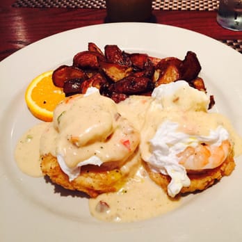 Eli's Table - Grits with shrimp Benedict.  I am GF so having grits cakes instead of bread made my day!! - Southern Near Me - Charleston, South Carolina