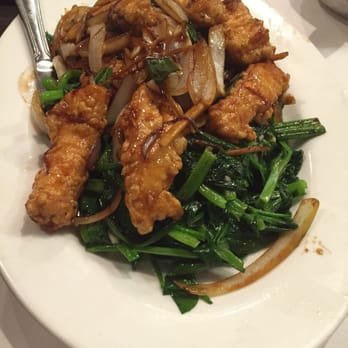 Apsara Palace - Crispy fish w/ pea pod leaves in a ginger scallion sauce (Yummmy) dish is much larger in person - Chinese Near Me - Providence, Rhode Island