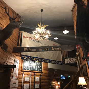 Aspen Restaurant - Bar - Banquets - a deer head mounted on the wall - American Near Me - Macomb, Michigan