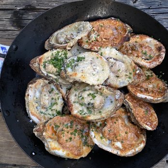 La Lucha - Wood roasted oysters: half smoked jalapeño half parmesan garlic - Seafood Near Me - Houston, Texas