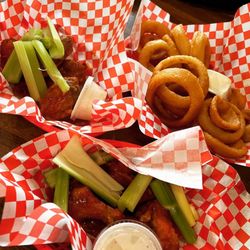 Smoke Eaters - 10 wingers with traditional and atomic sauces and a side of onion rings