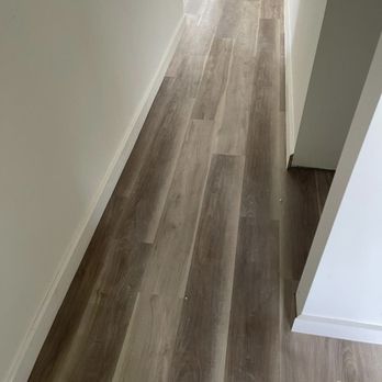 Newcastle Flooring - a hardwood floor in a hallway - Flooring Near Me Newcastle Flooring - a hardwood floor in a hallway - Flooring Near Me