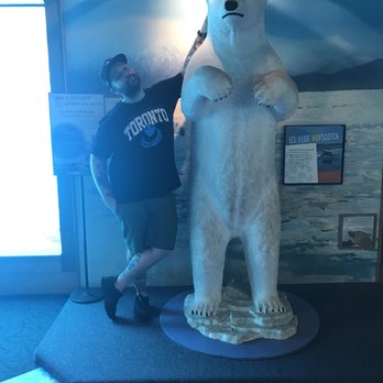 Seneca Park Zoo - Canadian male stands next to male polar bear. - Zoos Near Me - Rochester, New York Seneca Park Zoo - Canadian male stands next to male polar bear. - Zoos Near Me - Rochester, New York