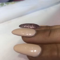 You can see the glitter nail is bumpy You can see the glitter nail is bumpy