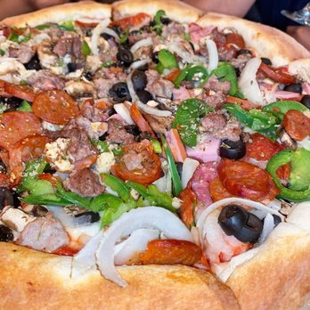 Skipolini's - Up close shot of PREGO pizza - Italian Near Me - Rocklin, California