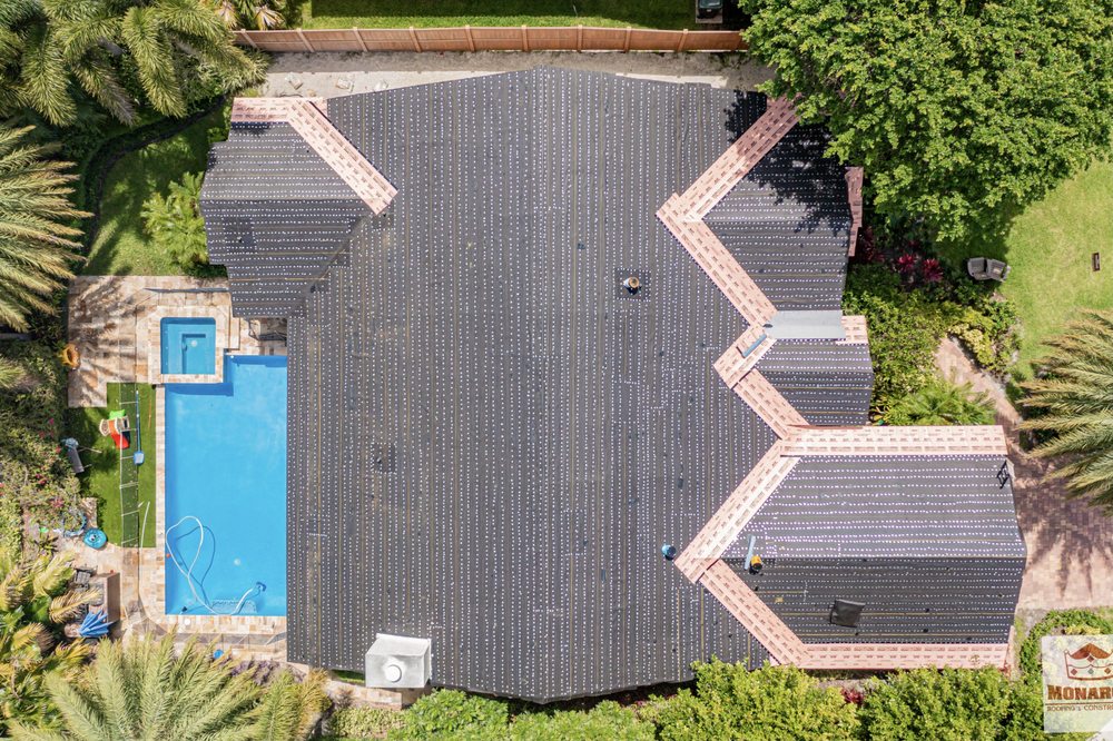 Slide of Monarch Roofing & Construction Inc.