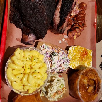 Terry Black's Barbecue - Beef ribs, brisket, jalapeno cheddar sausage Sides: Mac n cheese, cornbread, potato salad, coleslaw, creamed corn, peach cobbler - Barbeque Near Me - Austin, Texas Terry Black's Barbecue - Beef ribs, brisket, jalapeno cheddar sausage Sides: Mac n cheese, cornbread, potato salad, coleslaw, creamed corn, peach cobbler - Barbeque Near Me - Austin, Texas