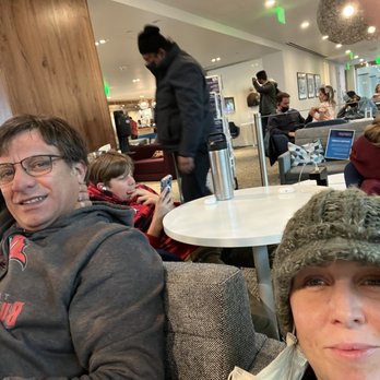 The Centurion Lounge - Our comfy spot with outlets and good WiFi - Airport Lounges Near Me - Denver, Colorado