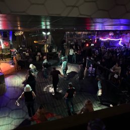 a crowd of people dancing a crowd of people dancing