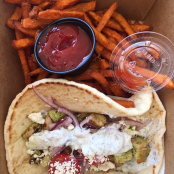 Cafe Metropole - Chicken pita with sweet potato fries - Sandwiches Near Me - Avalon, California Cafe Metropole - Chicken pita with sweet potato fries - Sandwiches Near Me - Avalon, California