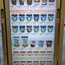 a display of yogurt and ice creams a display of yogurt and ice creams