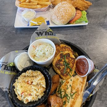 Wharf Casual Seafood - a plate of fried fish, fries, coleslaw and coleslaw - Seafood Near Me - Valdosta, Georgia