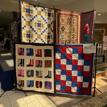 Sew ‘N Sweep - Quilt display at the Townmall of Westminster June 2024. - Special Education Near Me - Westminster, Maryland