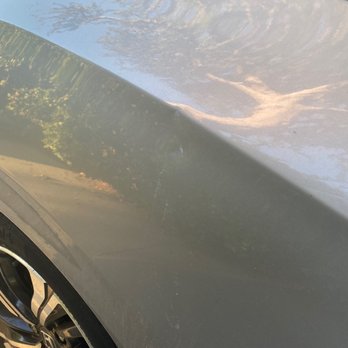 Metro Honda - The scratch goes all the way down. It's a white scratch but it's hard to see because the car is silver. The dent is there. - Car Dealers Near Me - Montclair, California Metro Honda - The scratch goes all the way down. It's a white scratch but it's hard to see because the car is silver. The dent is there. - Car Dealers Near Me - Montclair, California
