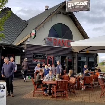 The Ranch Bar & Grill - People sitting in the cold. Must have been 62 degeees farenheit. - American Near Me - Te Anau, STL