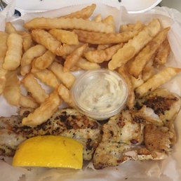 Grilled tilapia and fries.