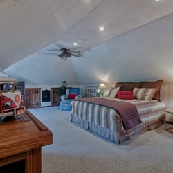 River Jewel Suites - Lovely 600 sq. ft. Sequoia Charm Suite with private balcony overlooking the river, sitting area, bathroom and kitchenette.