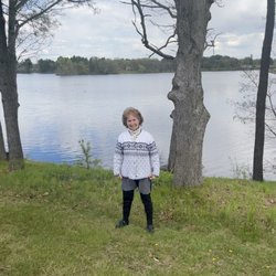 Wellington Place at Whiting - Mom by the lake right across from her suite. She loves to watch the ducks and geese that gather there.