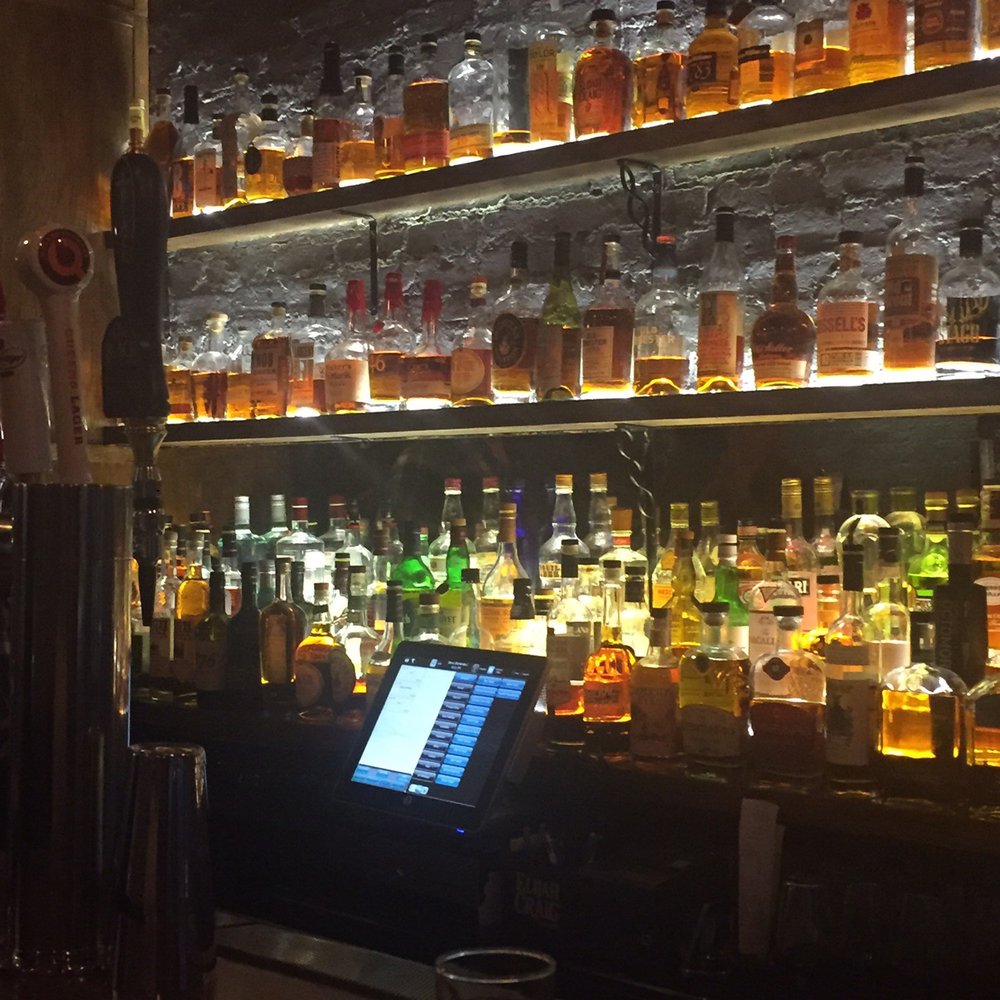 The Hamilton - wall of whiskey - Cocktail Bars Near Me - New York, New York The Hamilton - wall of whiskey - Cocktail Bars Near Me - New York, New York