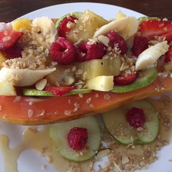 Kamoli - Fruit, granola, yogurt in a papaya bowl. - Breakfast & Brunch Near Me - San Juan, Puerto Rico Kamoli - Fruit, granola, yogurt in a papaya bowl. - Breakfast & Brunch Near Me - San Juan, Puerto Rico