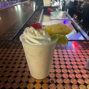 Ned Peppers Bar - a drink with whipped cream and a cherry on top - Tiki Bars Near Me - Dayton, Ohio Ned Peppers Bar - a drink with whipped cream and a cherry on top - Tiki Bars Near Me - Dayton, Ohio