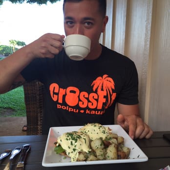 Anuenue Cafe - My husband having the Duck Dive Eggs Benedict - Cafes Near Me - Koloa, Hawaii Anuenue Cafe - My husband having the Duck Dive Eggs Benedict - Cafes Near Me - Koloa, Hawaii