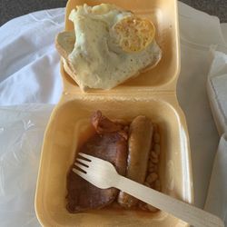 Picnic Box - The first breakfast item on the menu: bacon, egg, sausage, beans, and toast.