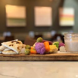 222 Union Restaurant and Bar - MEZZE PLATTER truffled white bean hummus, mixed olives, cornichons, cocktail onions, multi-colored cauliflower, baby carrots, and pita bread