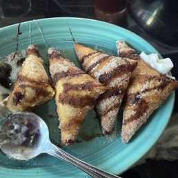 Sopapillas (menu does not say that they come covered in chocolate and honey drizzle)