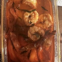 Thai Take-Away - Scampi in rode curry meeneem