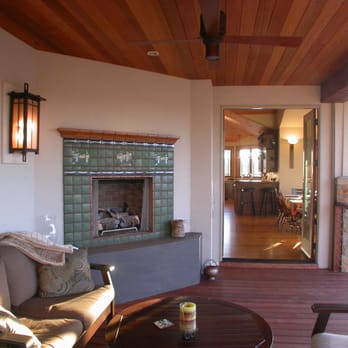 Steven Clipp Architecture - A quiet porch with a great view and a fire for those cool evenings. Motorized screens add to the open feel. - Architects Near Me - Chapel Hill, North Carolina Steven Clipp Architecture - A quiet porch with a great view and a fire for those cool evenings. Motorized screens add to the open feel. - Architects Near Me - Chapel Hill, North Carolina