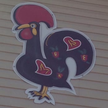 The Lucky Rooster Pub & Eatery - a rooster with hearts on it's tail - American Near Me - St. Jacob, Illinois
