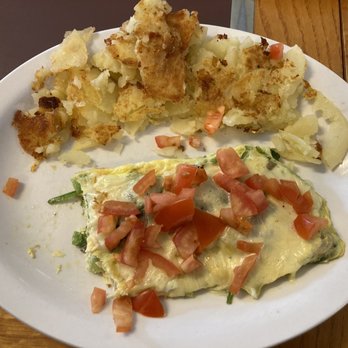 Valley Inn Restaurant - an omelet with tomatoes on it - Breakfast & Brunch Near Me - Lakewood, Colorado