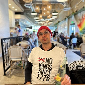 Flower Child - Topochico pairs well with anything on the menu. No Kings T shirt optional. - Salad Near Me - Indianapolis, Indiana