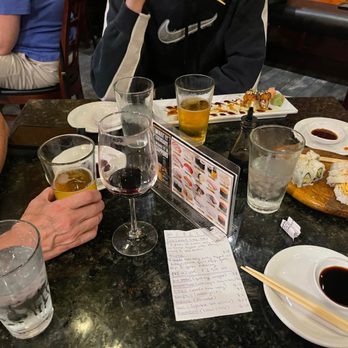 Ichi Umi Sushi - 4 people at a table, all served 15 minutes to one hour apart for just one sushi roll from menu.  We were unable to dine together. - Sushi Bars Near Me - Austin, Texas