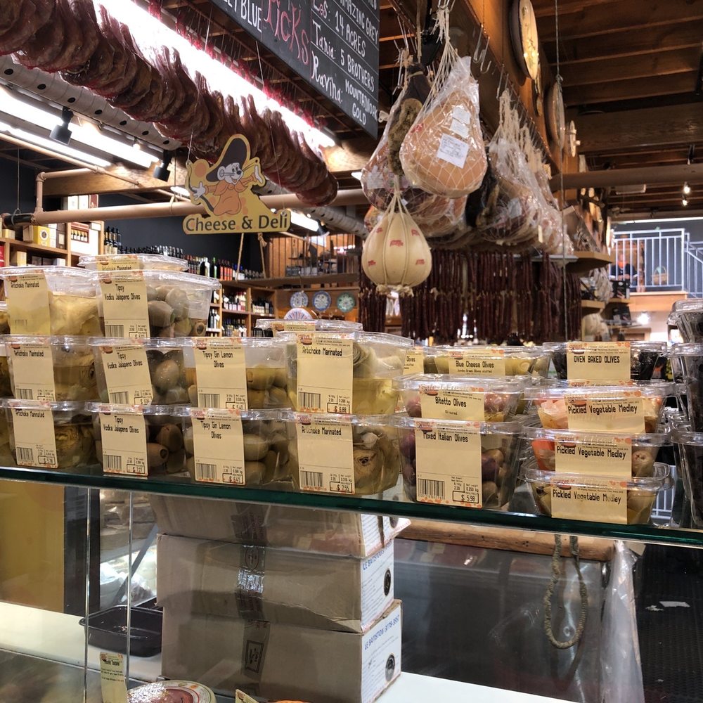 Cheese Boutique - a variety of cheeses in a display case - Cheese Shops Near Me - Toronto, Ontario