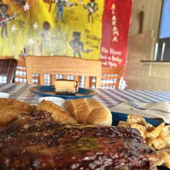 Central BBQ - Half slab with onion rings and pork grinds, Peanut Butter Pie deliciousness too - Barbeque Near Me - Memphis, Tennessee Central BBQ - Half slab with onion rings and pork grinds, Peanut Butter Pie deliciousness too - Barbeque Near Me - Memphis, Tennessee