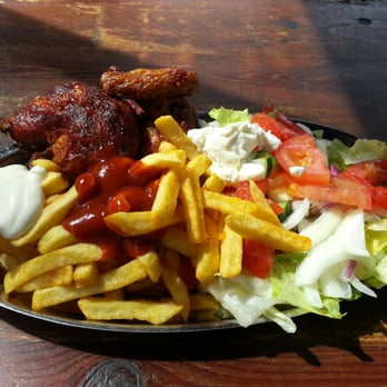 Hühnerhaus 36 - Rotisserie chicken with pommes and garlic sauce - Food Stands Near Me - Berlin, BE Hühnerhaus 36 - Rotisserie chicken with pommes and garlic sauce - Food Stands Near Me - Berlin, BE