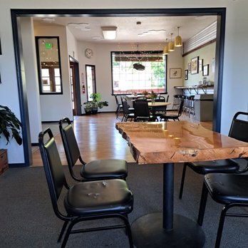 Potlatch Brewing Company - a table and chairs - Breweries Near Me - Hoodsport, Washington Potlatch Brewing Company - a table and chairs - Breweries Near Me - Hoodsport, Washington