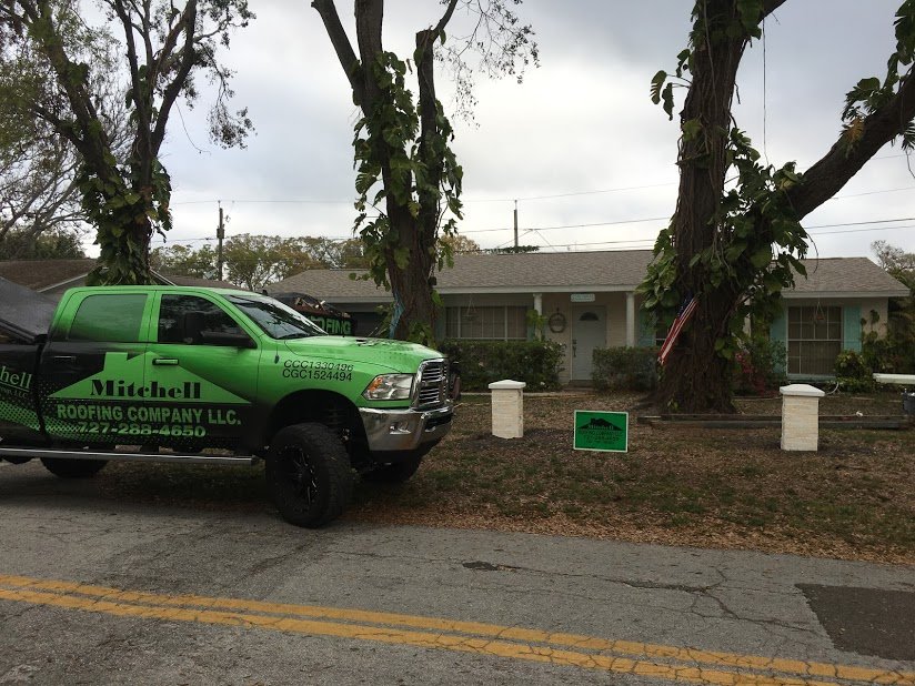 Slide of Mitchell Roofing Company