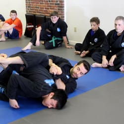 Revolution Martial Fitness - Demonstrating a "kimura" shoulder lock to the teen/adult class