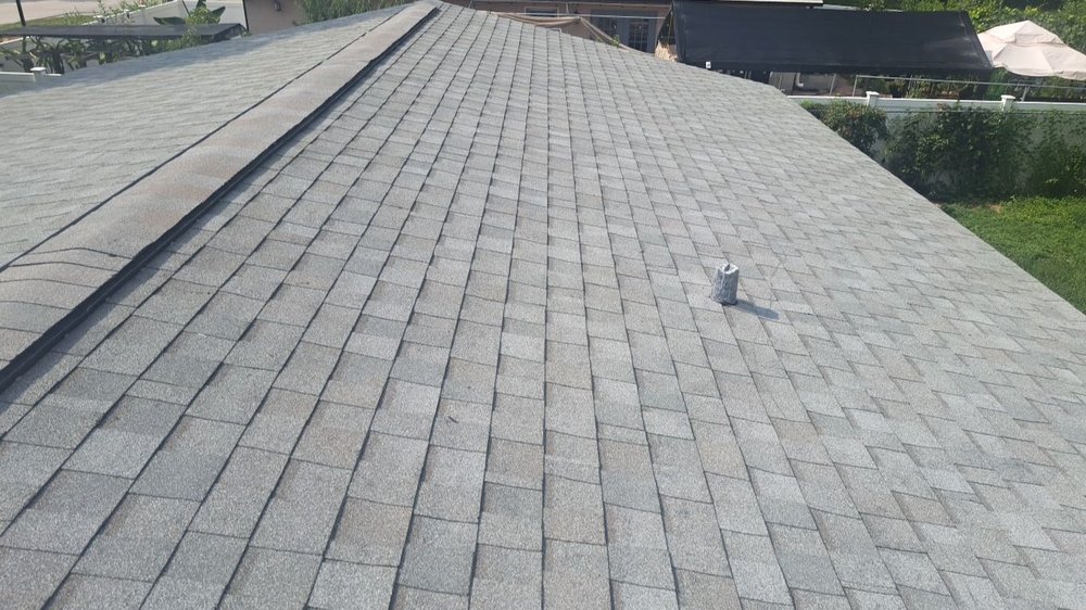 Slide of New Standard Roofing Orlando