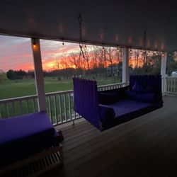 Ithaca Guest House - West porch at sunset