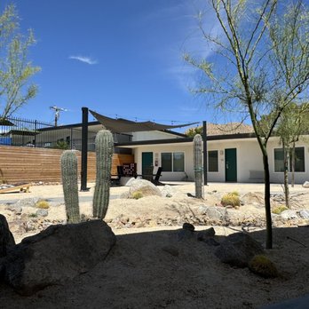 Field Station - Exterior desert patio with pool hiding in the background. - Hotels Near Me - Yucca Valley, California Field Station - Exterior desert patio with pool hiding in the background. - Hotels Near Me - Yucca Valley, California